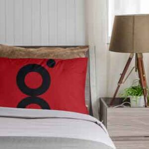 red-pillow-mock-up-on-bed